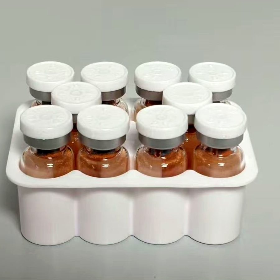 Vials organized in a downstream packaging tray
