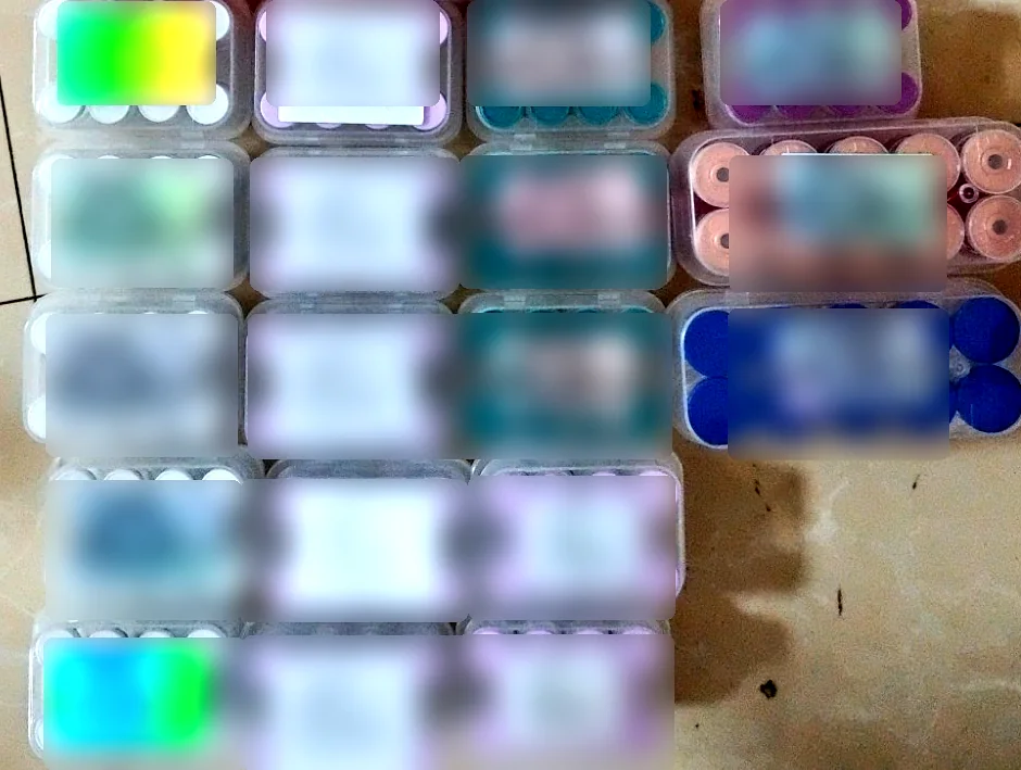 Assorted vial and tray presentations with batch and date details obscured for public display