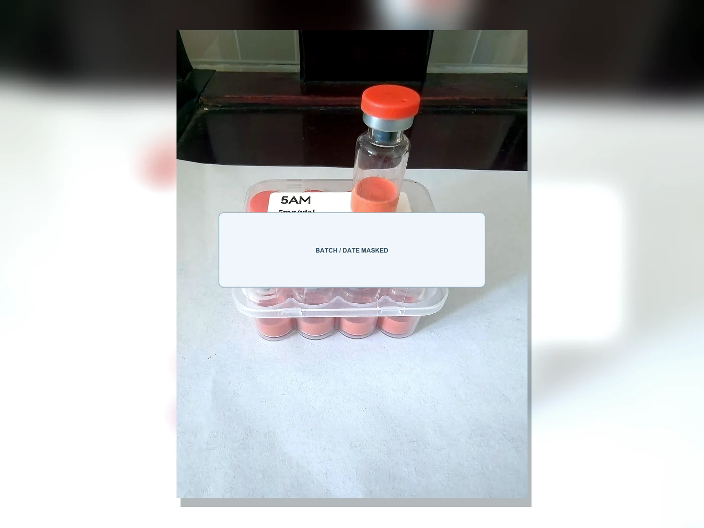 Public preview of 5AM tray and vial packaging with batch and date fields masked