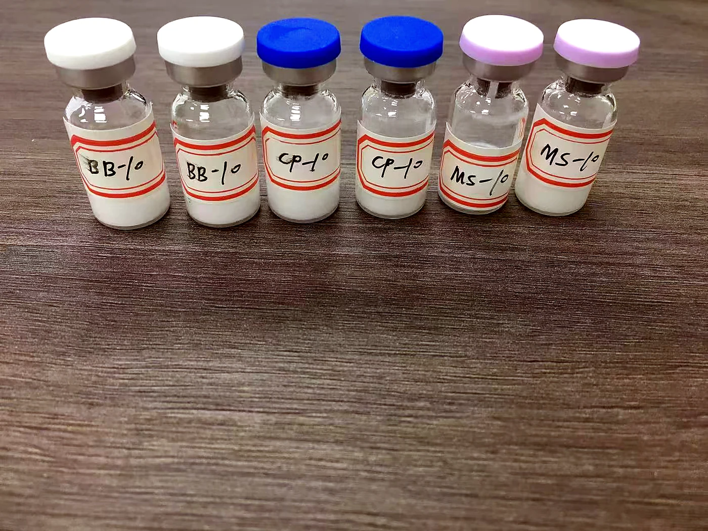 Real LyoPure Bio sample vials labeled BB-10, CP-10, and MS-10